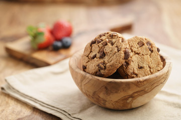 classic chocolate chip cookies in bowl, shallow focus