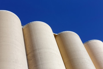 Silos on blue sky