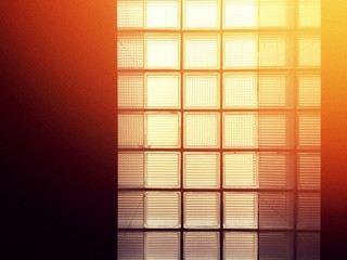 Many small square glass window background with light effect