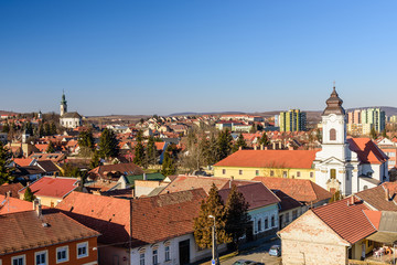 Aerial view of Eger with red tile roofs on a sunny day, Eger, Hungary