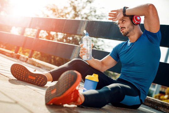 Thirsty Athlete Drinking Water After Workout