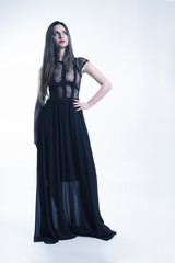 Naklejka premium Young model with black dress