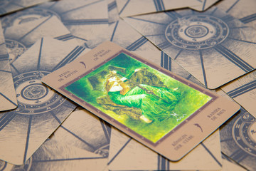Tarot card Qeen of Wands. Labirinth tarot deck. Esoteric background.