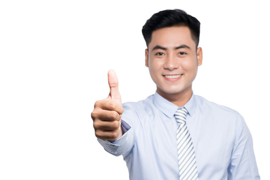 Handsome Asian Businessman Thumbs Up Sign On White