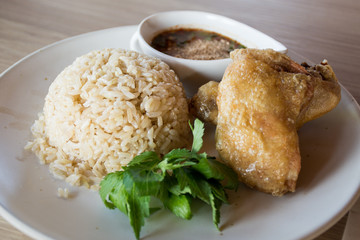 Rice with fried chicken.