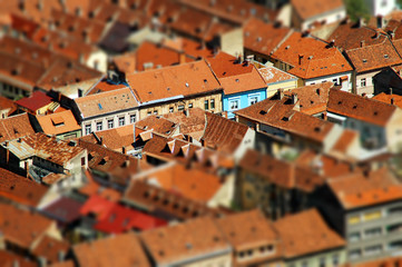 Rooftop tilt shift view of a European city. Brasov, Romania