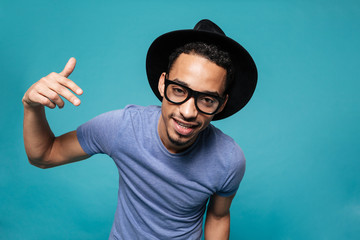 Portrait of a young casual afro american man in hat