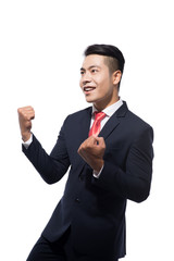 Winner. Business asian man celebrating.
