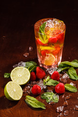 Coctail in a glass with raw fruit