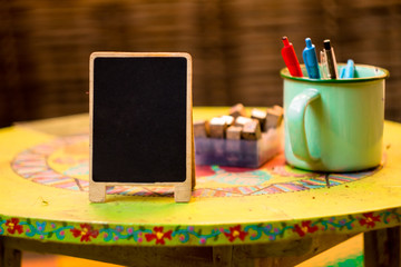 vintage Wooden board sign label on the table. Stand tent card Used for Menu Bar and restaurant or put everything into it . mockup