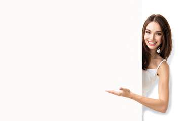 young woman, showing blank signboard