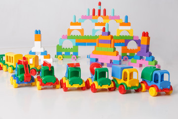 Bright, colorful cars. On a white background. Stuff is made from clay.