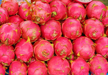 Dragon fruit on market stand, Thailand.