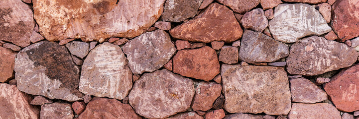 Natural stone wall background, stone texture