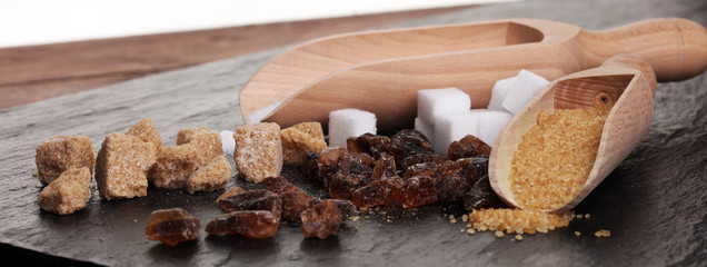 Various types of sugar, brown sugar and white