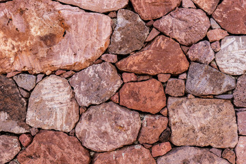 Obraz premium Natural stone wall background, stone texture