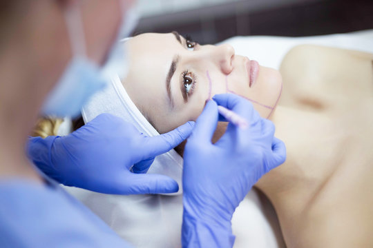 Cosmetic treatments for the skin in the beauty salon. Woman in spa salon