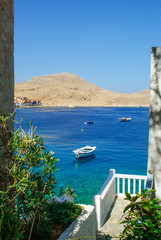 Turquoise waters exceptionally strong colors and sharp rocks that surround it