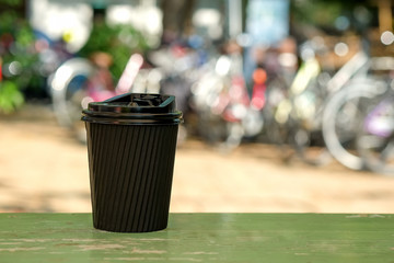 Take away coffee cup on table