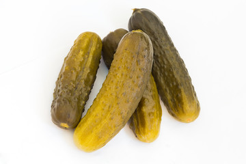 Pickled cucumbers on white isolated background