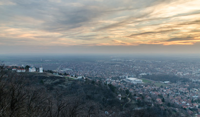 City in the valley at sunset