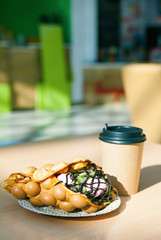 The Hong Kong waffles and paper coffee cup