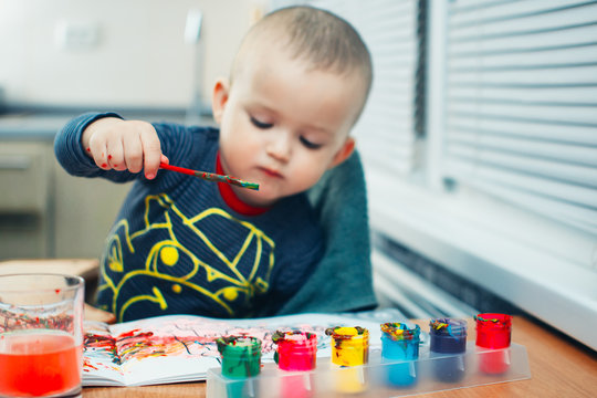 Child draws paints