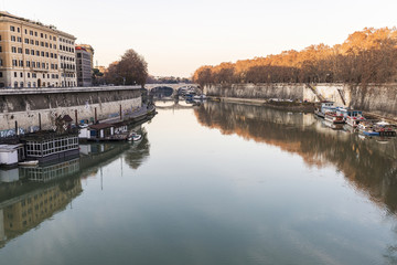 Fototapeta premium Bridge over the Tiber River in Rome, Italy