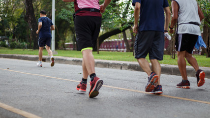 Fototapeta premium healthy lifestyle sports people running on fitness and healthy active lifestyle feet on road..