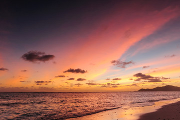 Fototapeta na wymiar Spectacular sunset above a paradise island