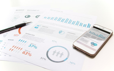 Modern white office desk white table with smartphone and computer and other supplies with Business report meeting and briefing. 