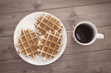 Coffee mug and waffles
