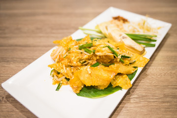Pad Thai Kiew Krob is a Thai local food. The fried dumpling is used as main ingredient for this Pad Thai