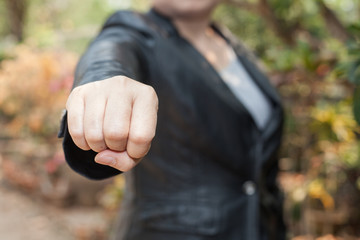 showing punch  sign with hand