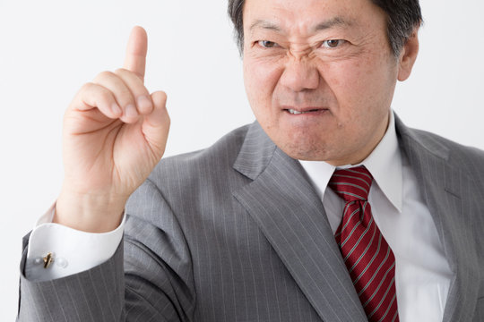 罵倒するビジネスマン、中年男性