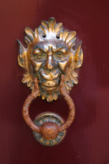Traditional knockers on the wooden door in Mdina, Malta. traditional Maltese door handle