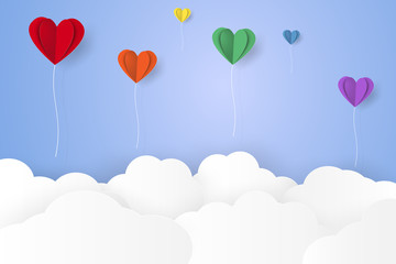 Fototapeta na wymiar Colorful heart balloons flying over cloud , paper art style