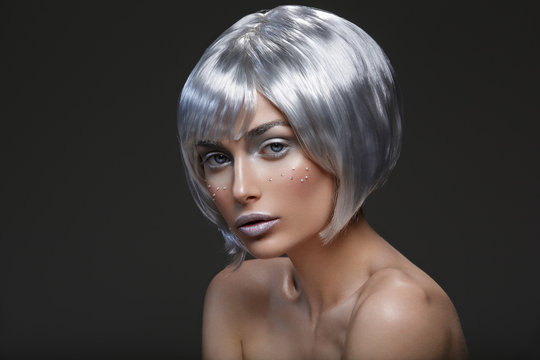 Beautiful girl in silver wig