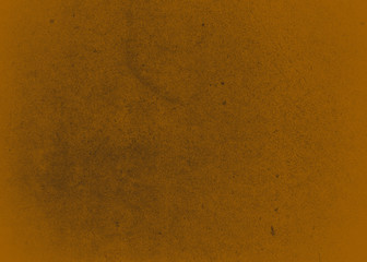 Orange-yellow textured background to the point with spots of paint. Background Colored texture Abstraction Banner Design