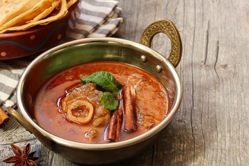 Rogan Josh / Kashmiri Lamb curry served in a Kadai, selective focus