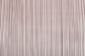 Soft pink pleated fabric. Plisse fabric texture  background.