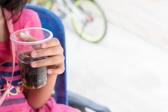 Close Up Drinking Cola From Glass