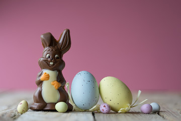 easter theme background eggs bunny nest daffodils symbol spring