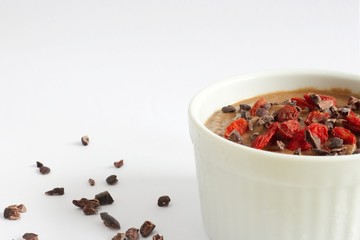 Healthy pudding made from the cauliflower, with cocoa nibs and goji berries.
