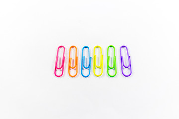 Office paper clips isolated on white background