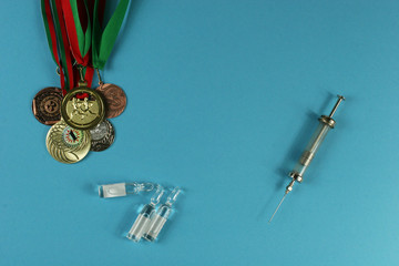 Concept of doping in sport - deprivation medals. Place for your text.