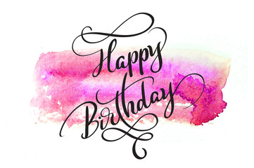 abstract watercolor background in red and text Happy Birthday. Calligraphy lettering