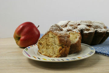 Apple and Slice of delicious fresh baked homemade Apple Pie