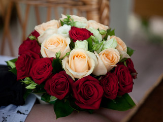 edding bouquet of bright red roses and bright
