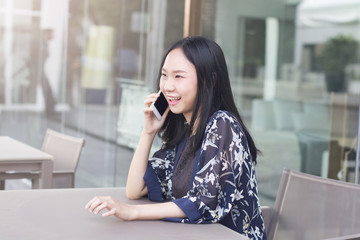 Fototapeta premium Asian woman is happiness when negotiating successful in business